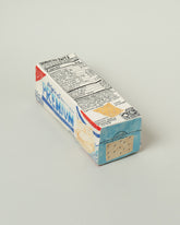 View from the back of the Suzanne Sullivan For Your Pleasure Saltine Box on light color background.