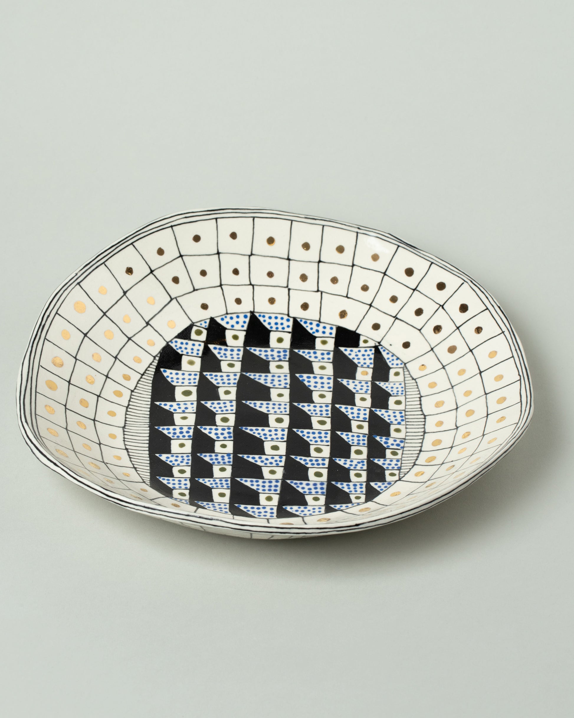Closeup details of the Suzanne Sullivan Four Pasta Bowl on light color background.