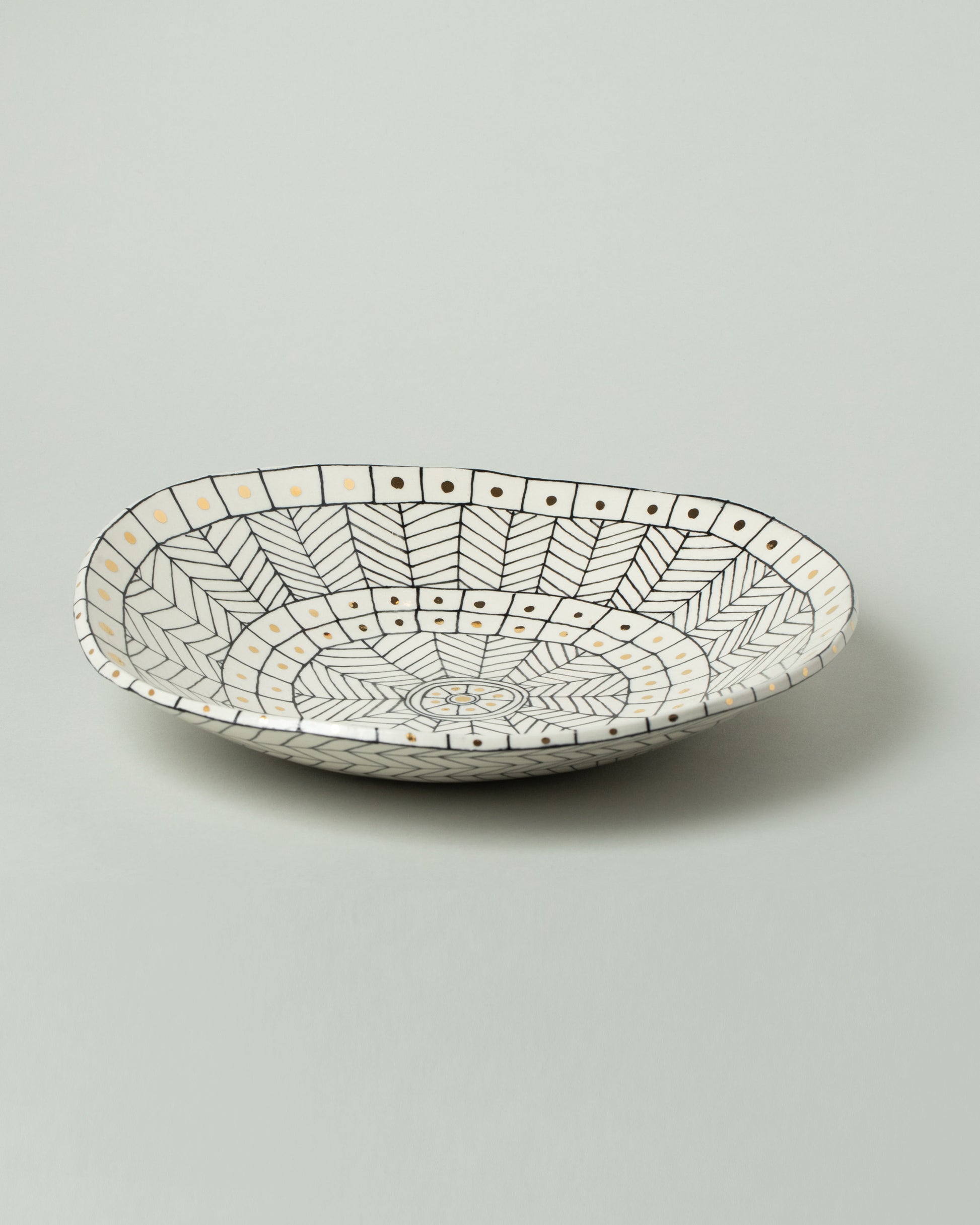 Suzanne Sullivan One Pasta Bowl on light color background.
