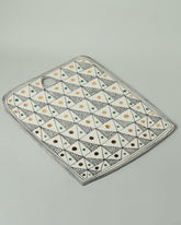 Suzanne Sullivan Three Board on light color background.