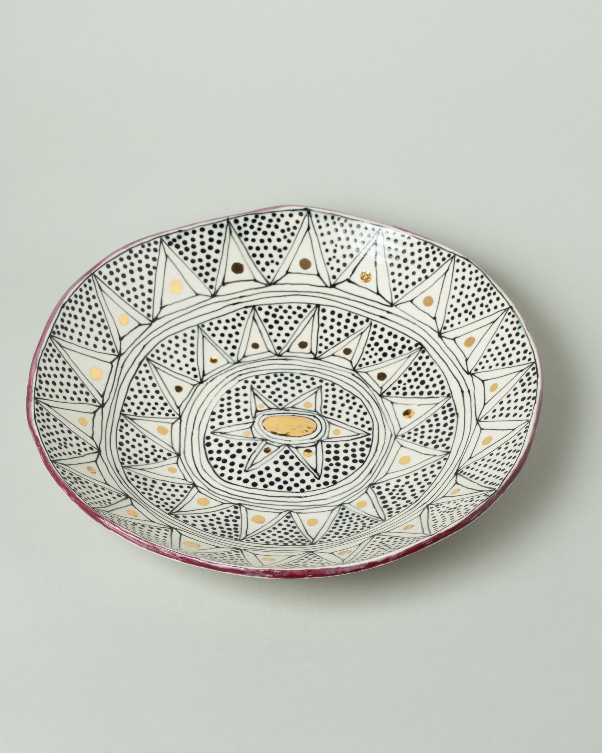 Closeup details of the Suzanne Sullivan Three Pasta Bowl on light color background.