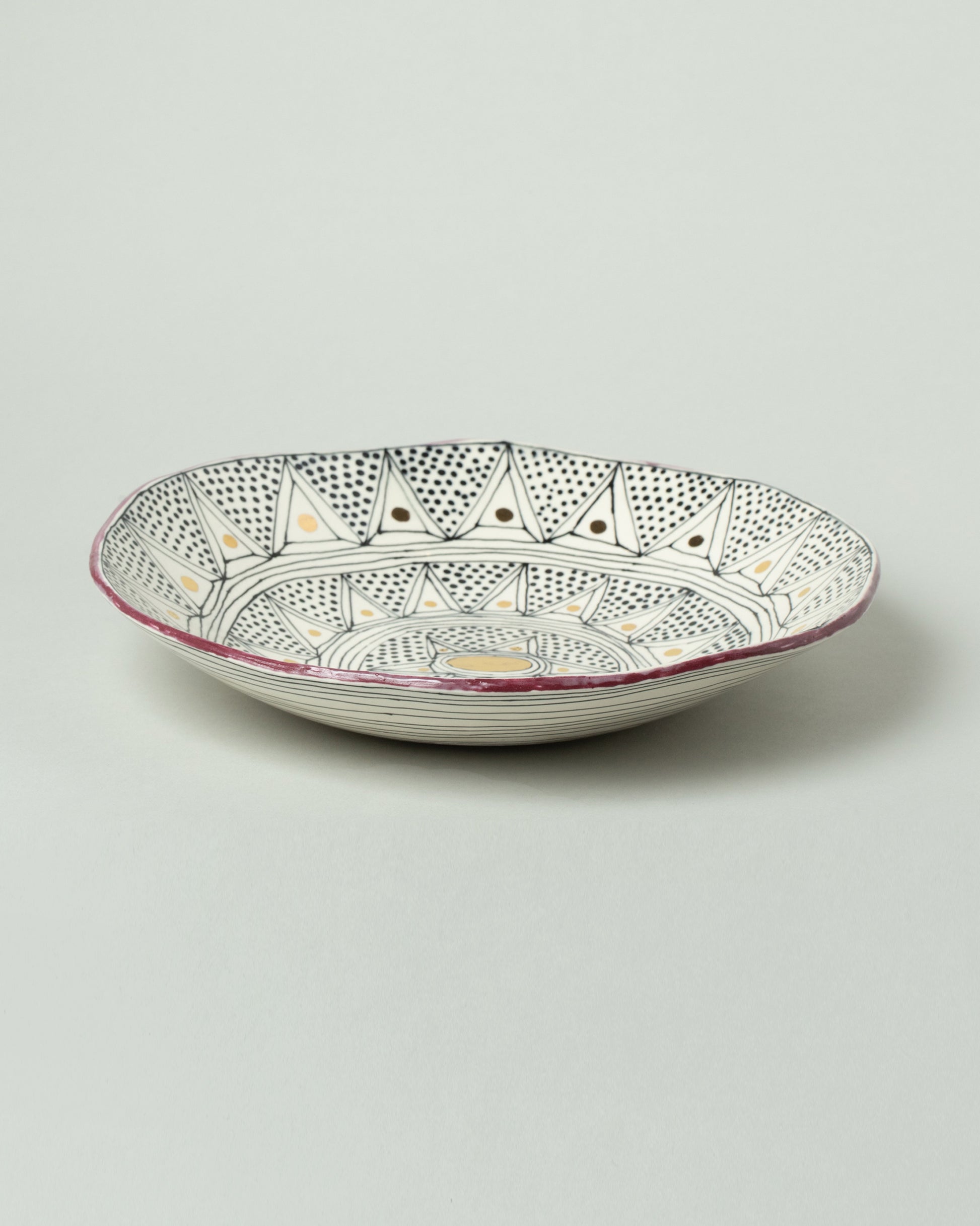 Suzanne Sullivan Three Pasta Bowl on light color background.