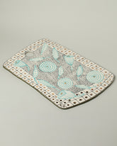 Suzanne Sullivan Two Board on light color background.