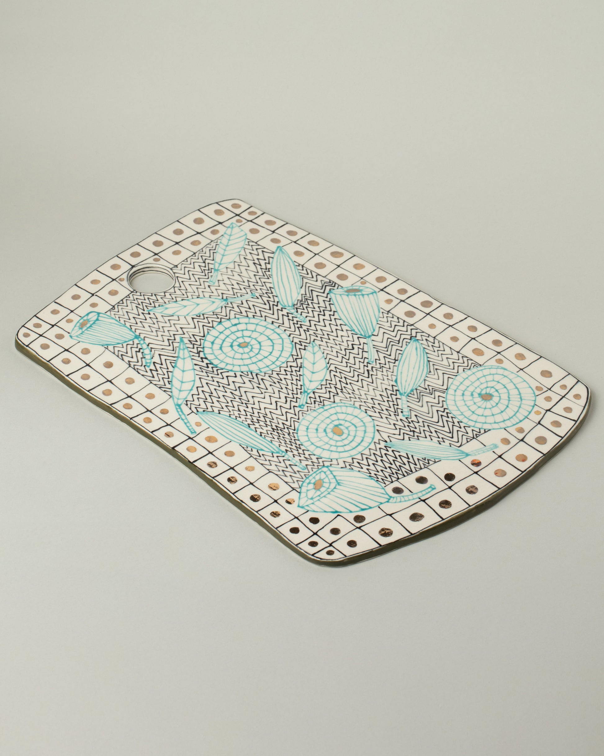 Suzanne Sullivan Two Board on light color background.