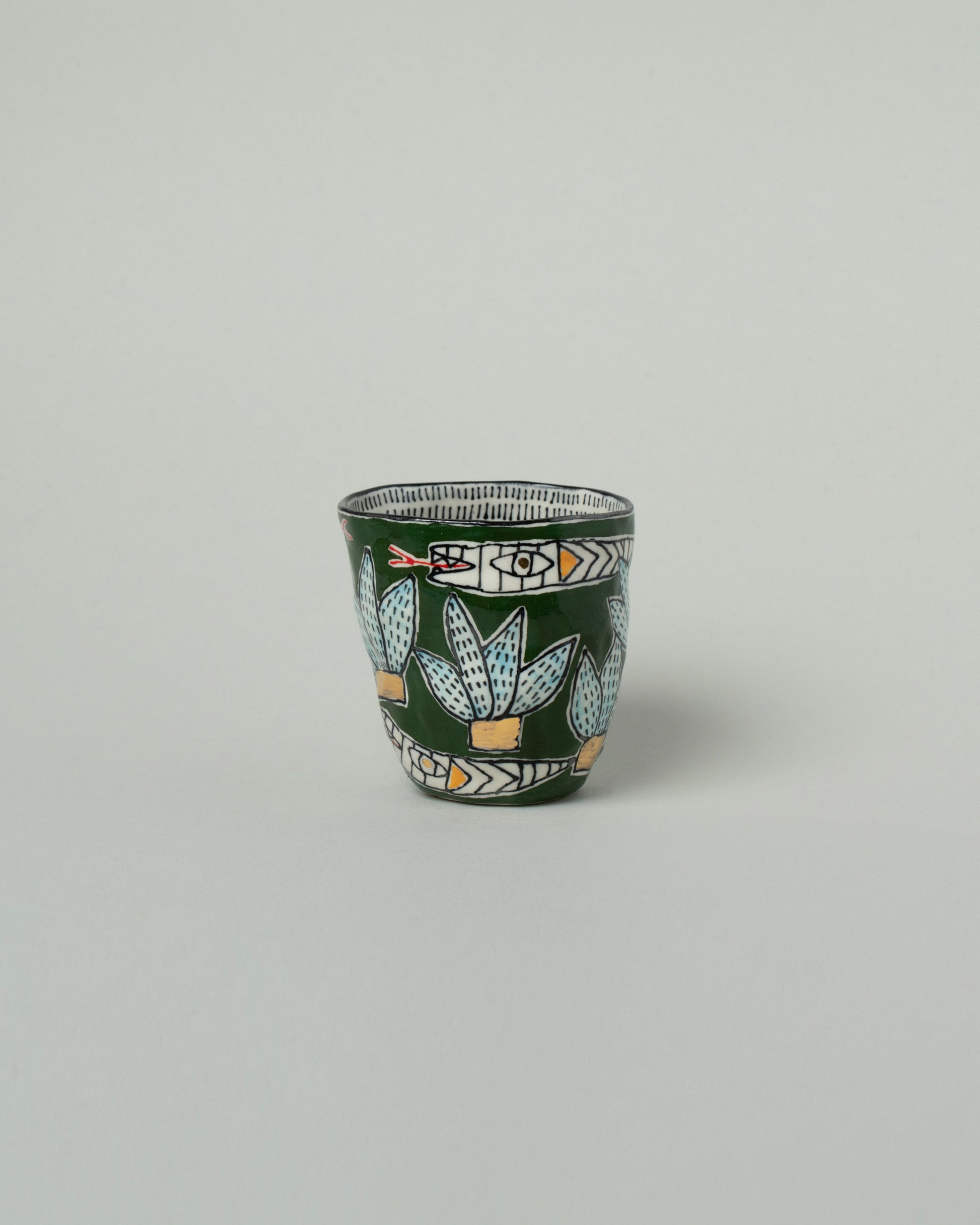 Suzanne Sullivan Five Pasture Tumbler on light color background.