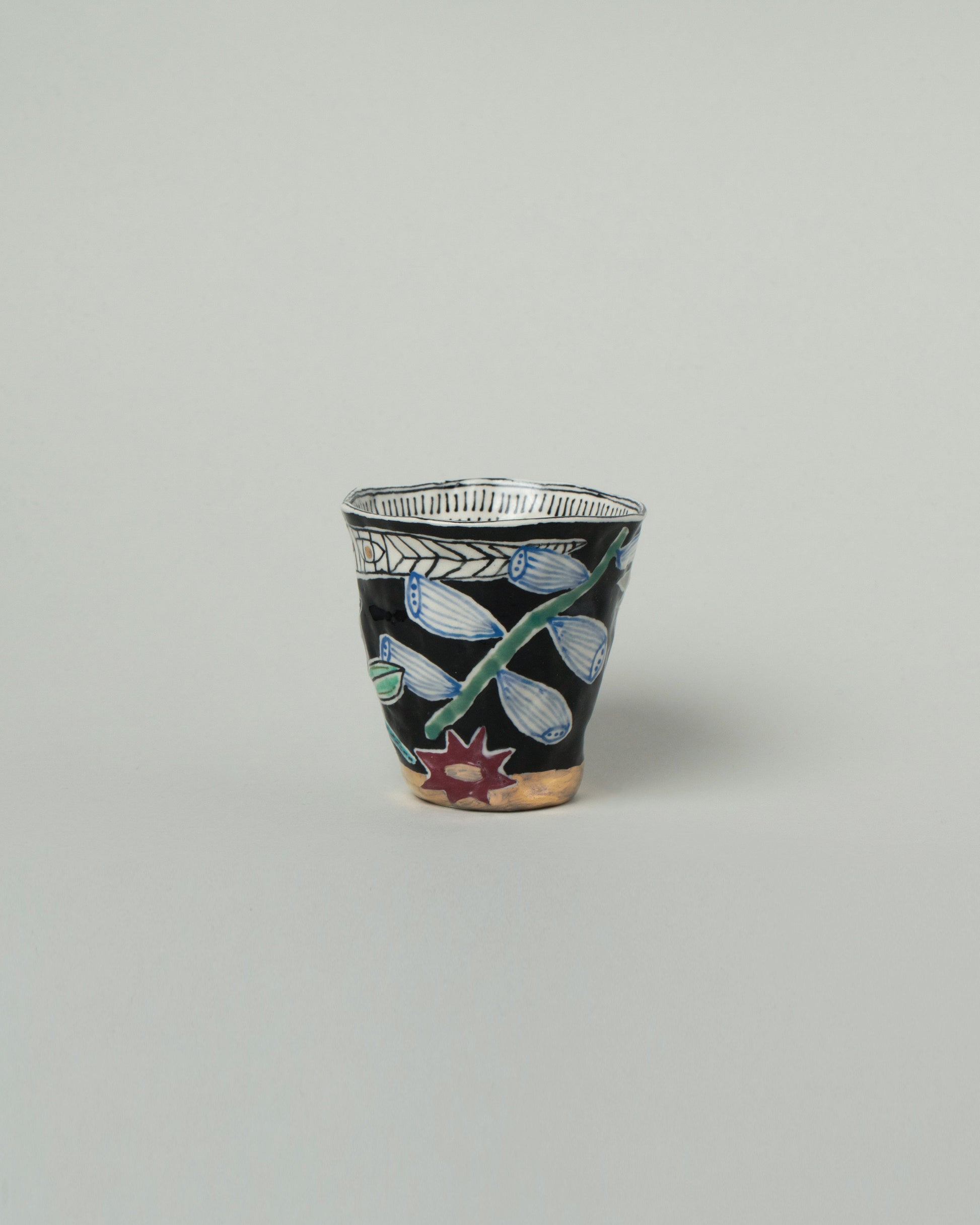 Suzanne Sullivan Four Pasture Tumbler on light color background.