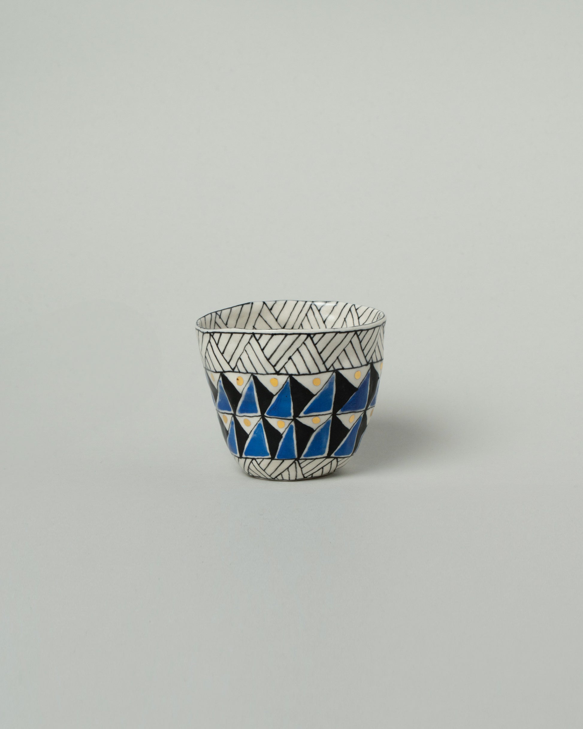 Suzanne Sullivan Seven Pasture Tumbler on light color background.