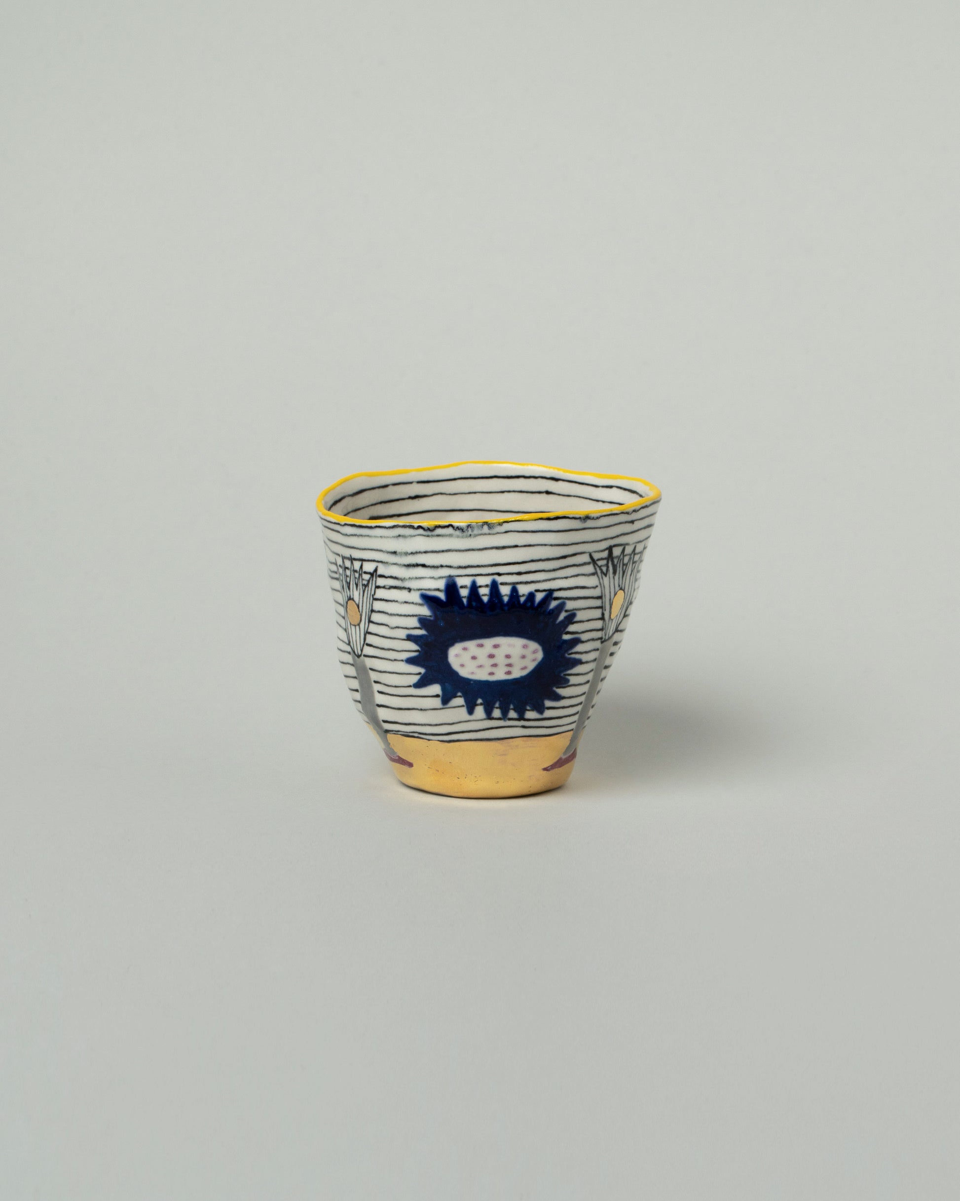 Suzanne Sullivan Two Pasture Tumbler on light color background.