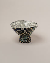 Suzanne Sullivan Answers To Questions Footed Bowl on light color background.