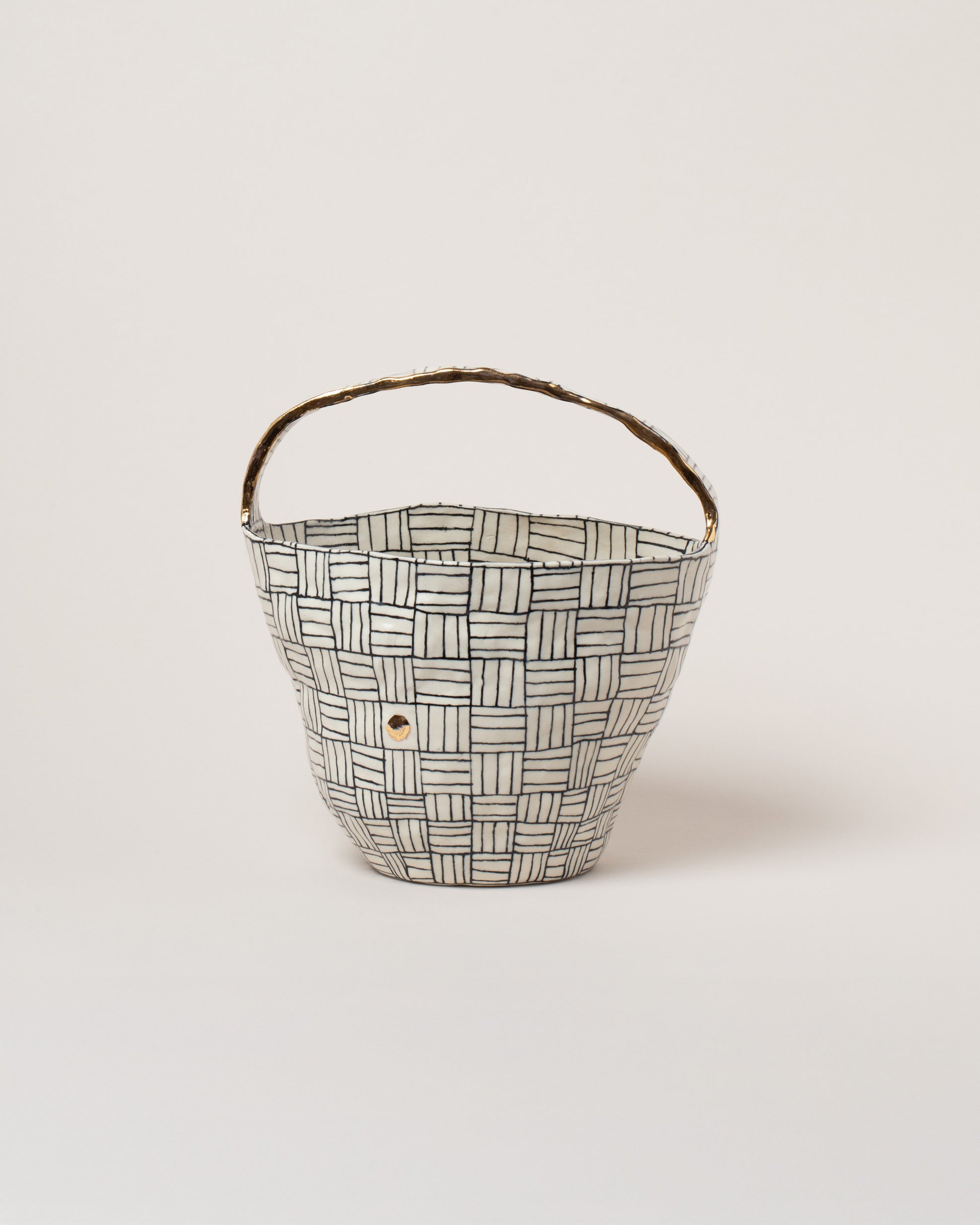 Suzanne Sullivan Black I Hope To Tell You Something Basket on light color background.