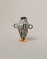 Suzanne Sullivan The Livelong Day Vase on light color background.