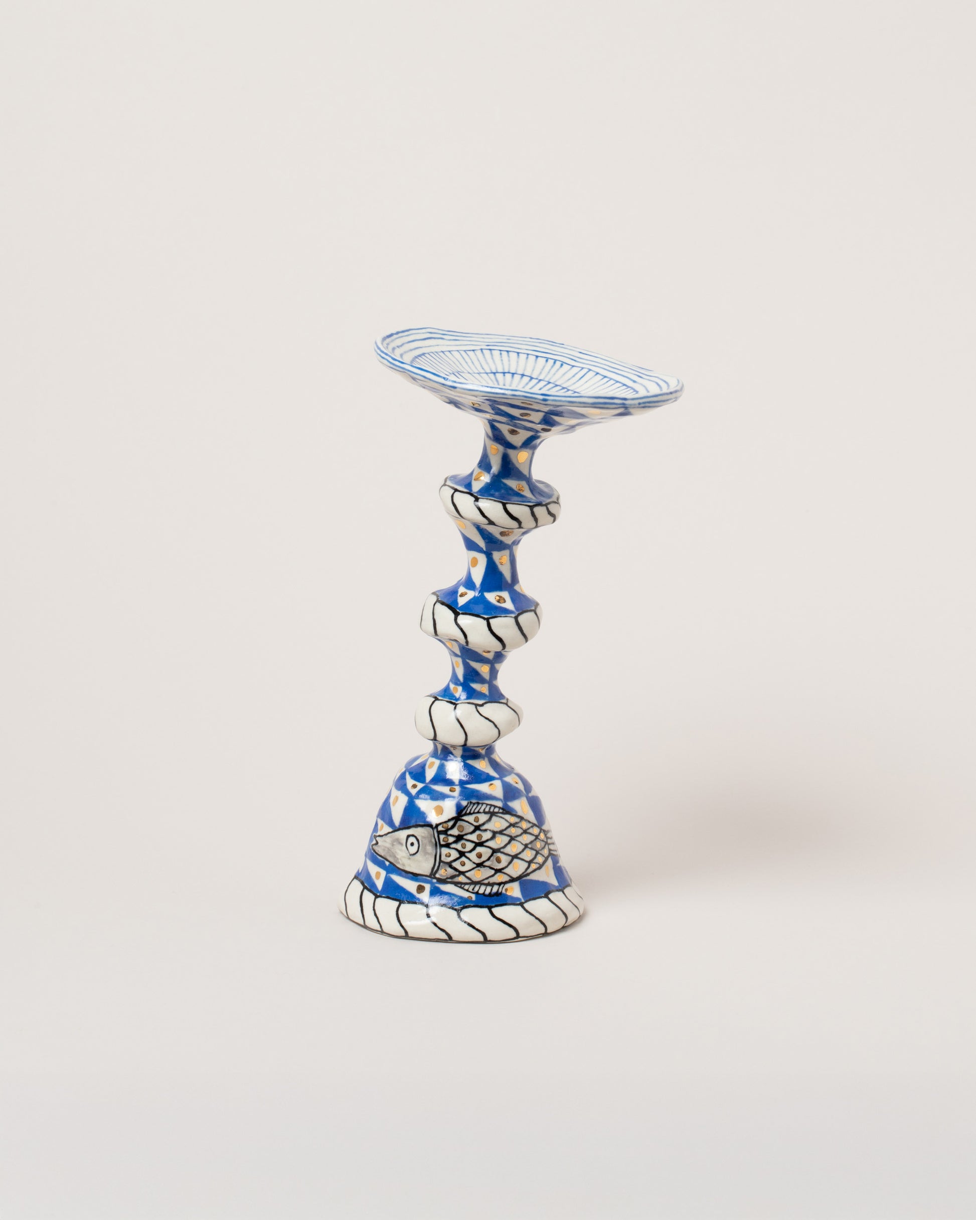 Suzanne Sullivan The Whole Night Long Candlestick on light color background.