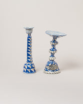 Suzanne Sullivan You'll Have To Distort It Candlestick and Suzanne Sullivan The Whole Night Long Candlestick on light color background.