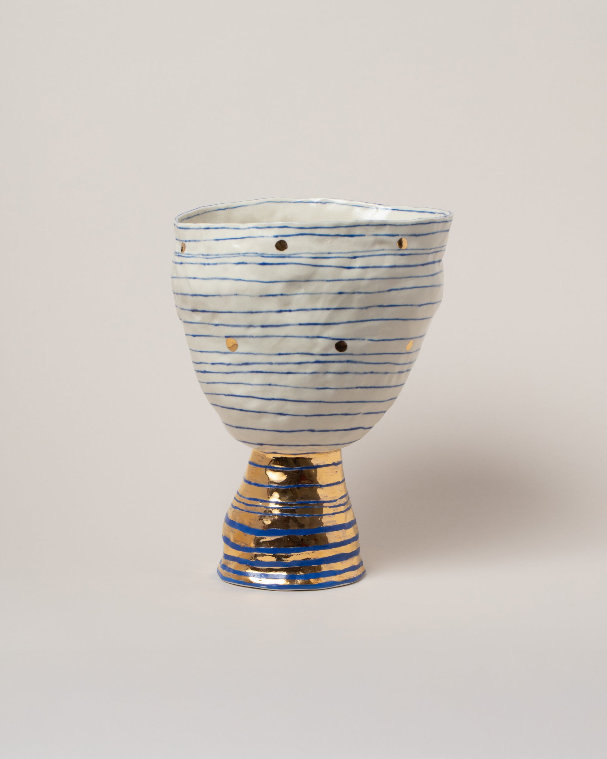 Suzanne Sullivan Unaffected & Demure Footed Bowl Vase on light color background.