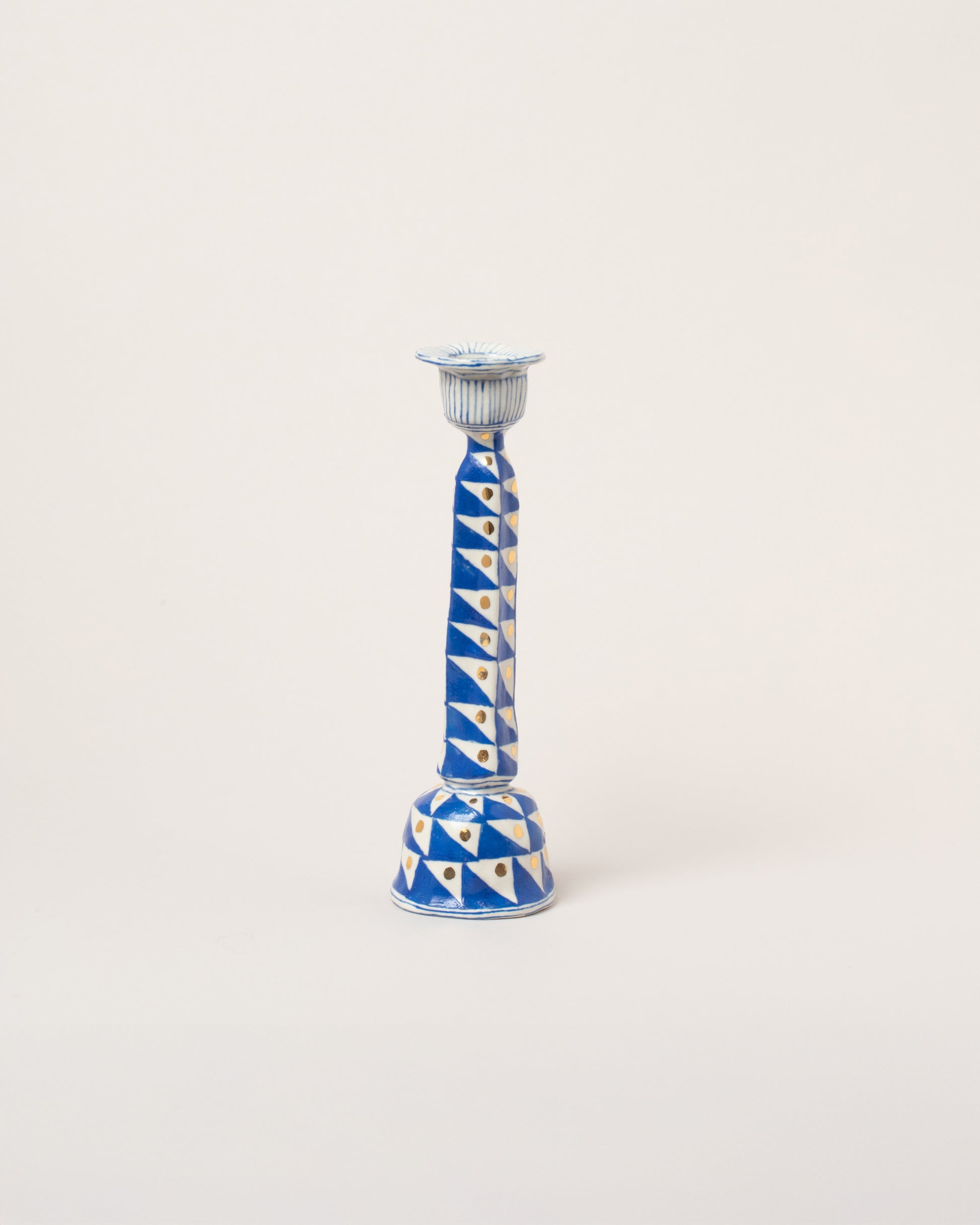 Suzanne Sullivan The Whole Night Long Candlestick on light color background.