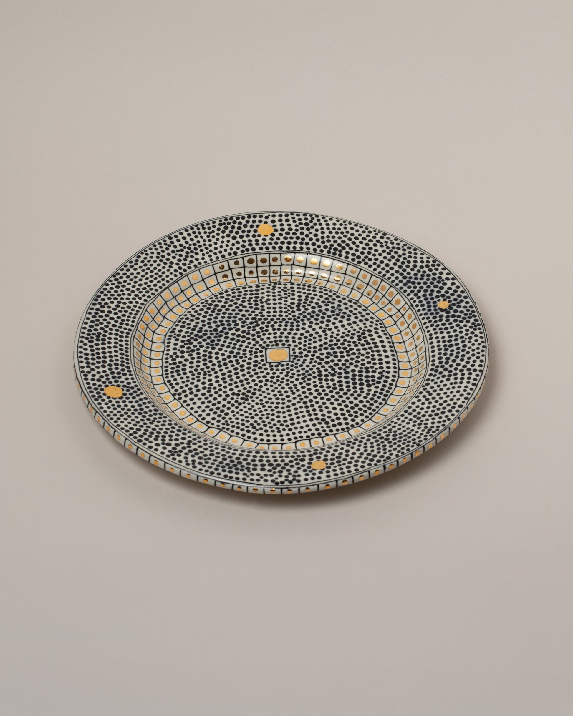 Suzanne Sullivan Four Fell Into A Trance Plate on light color background.