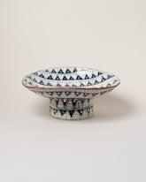 Suzanne Sullivan For To Be Sure and It's An Uncertain World Shallow Footed Bowl on light color background.