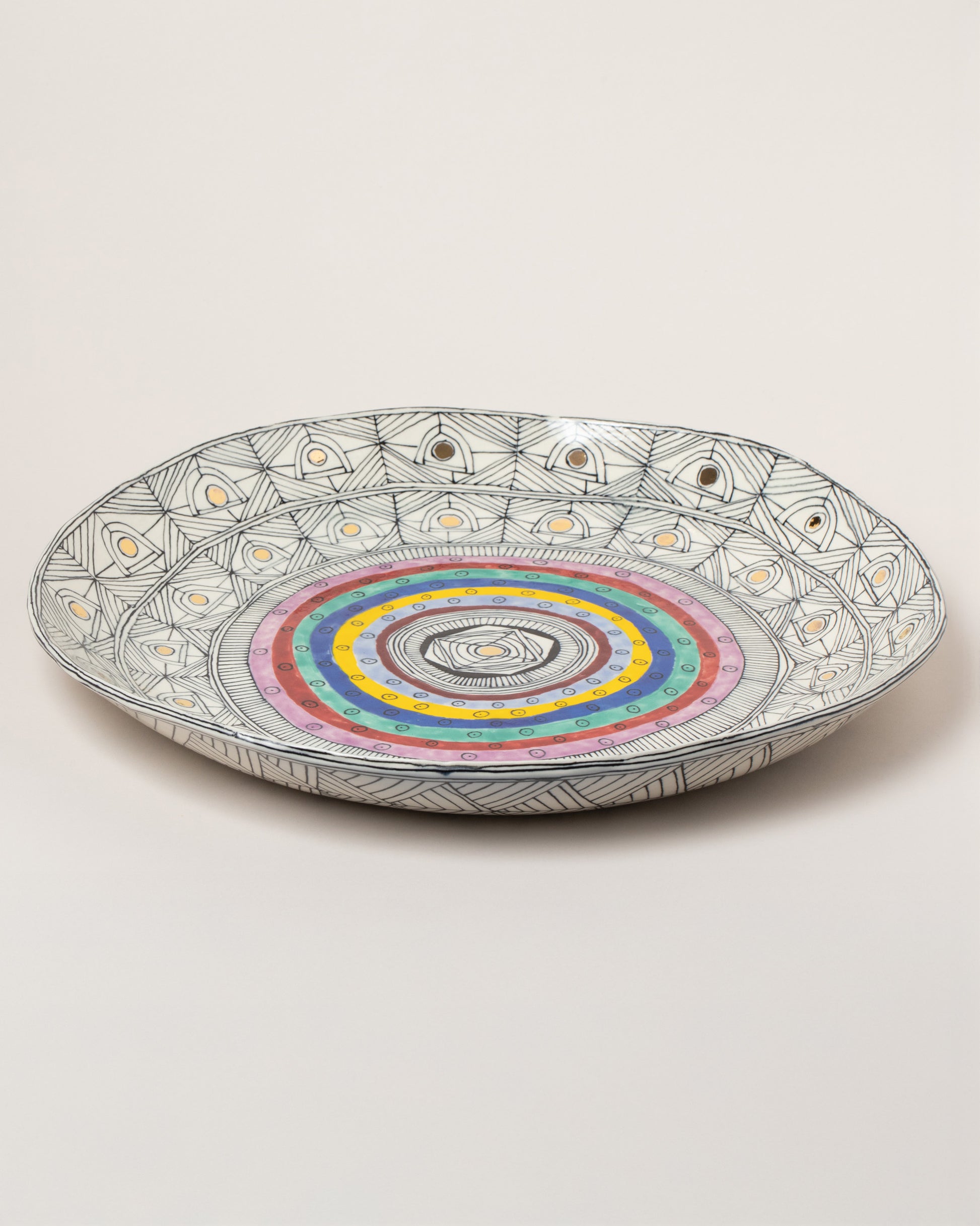 Suzanne Sullivan Frantically Seeking Happiness Platter on light color background.