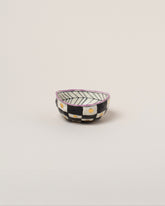 Suzanne Sullivan One Full Of Deepest Meaning Small Bowl on light color background.