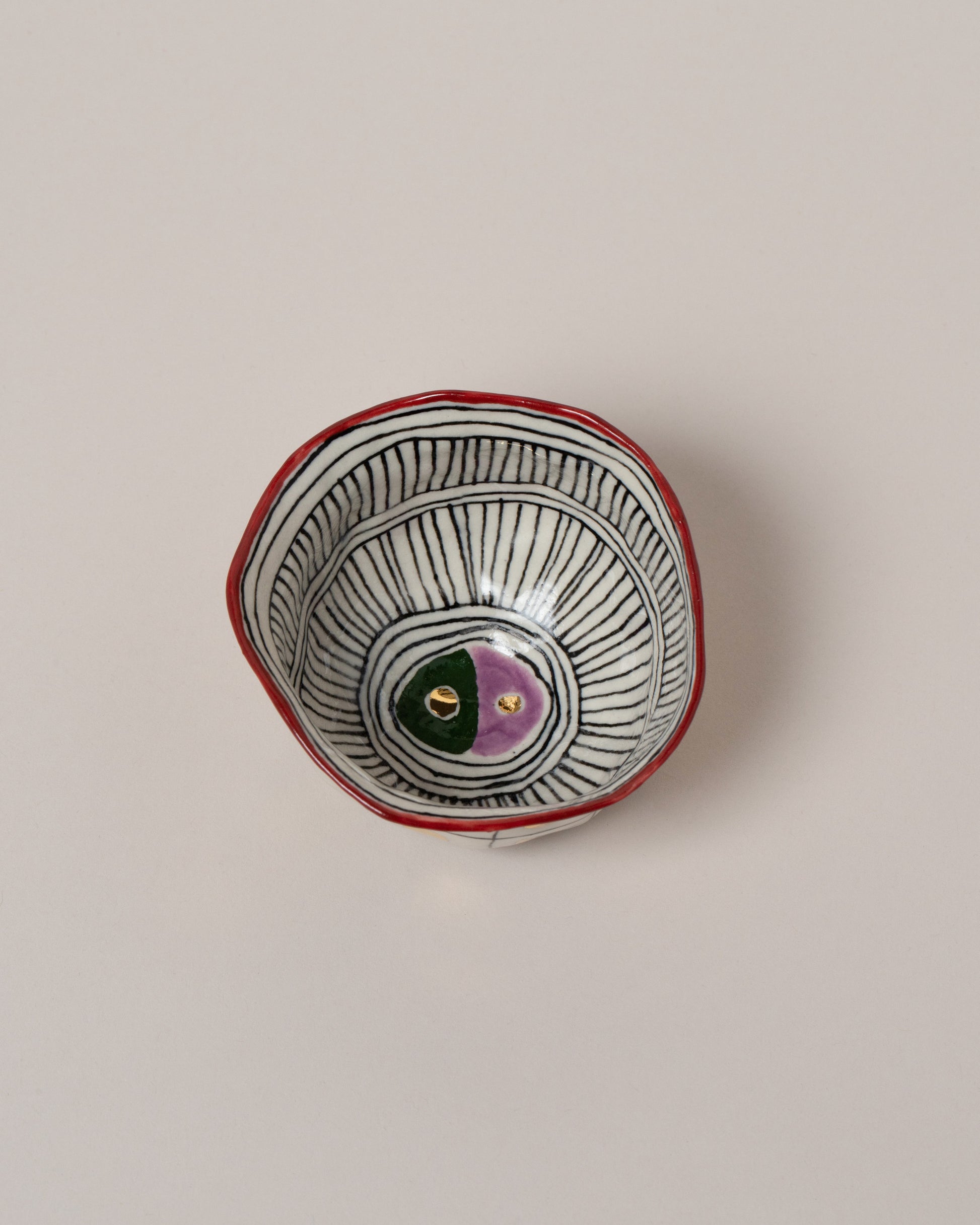 Suzanne Sullivan Three Full Of Deepest Meaning Small Bowl on light color background.