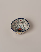 Suzanne Sullivan Five Full Of Deepest Meaning Small Bowl on light color background.