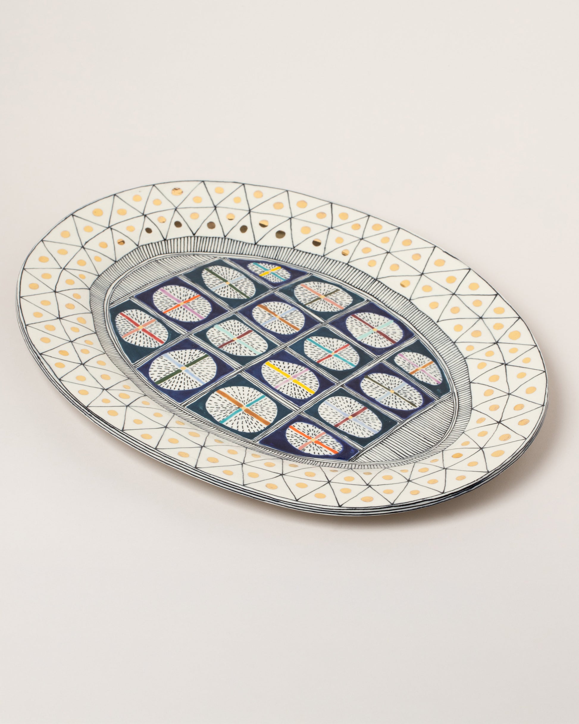 Suzanne Sullivan Liberal Instrument Of Largesse Platter on light color background.