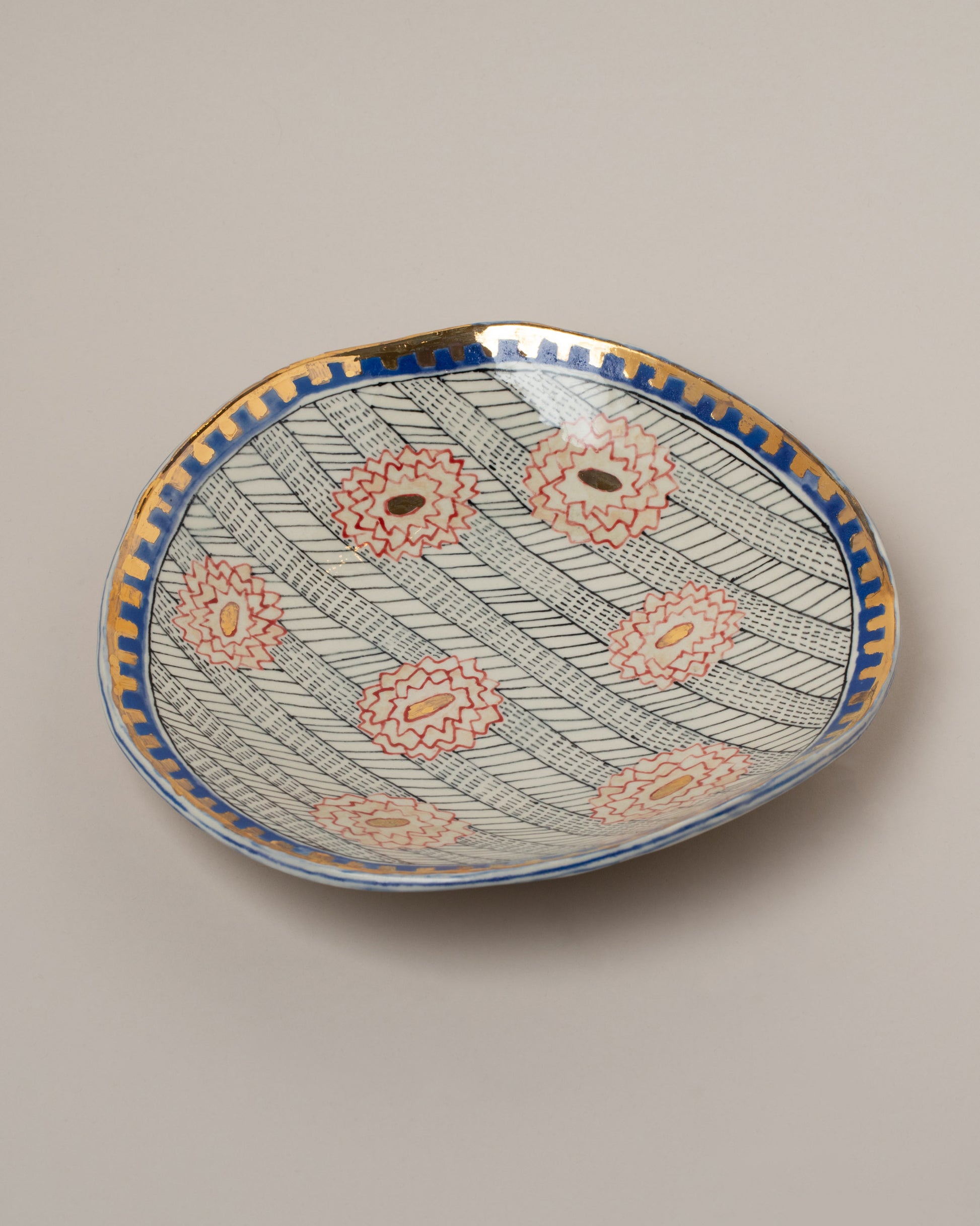 Suzanne Sullivan Four Saintly & Virtuous Pasta Bowl on light color background.