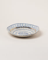 Suzanne Sullivan Five Saintly & Virtuous Pasta Bowl on light color background.