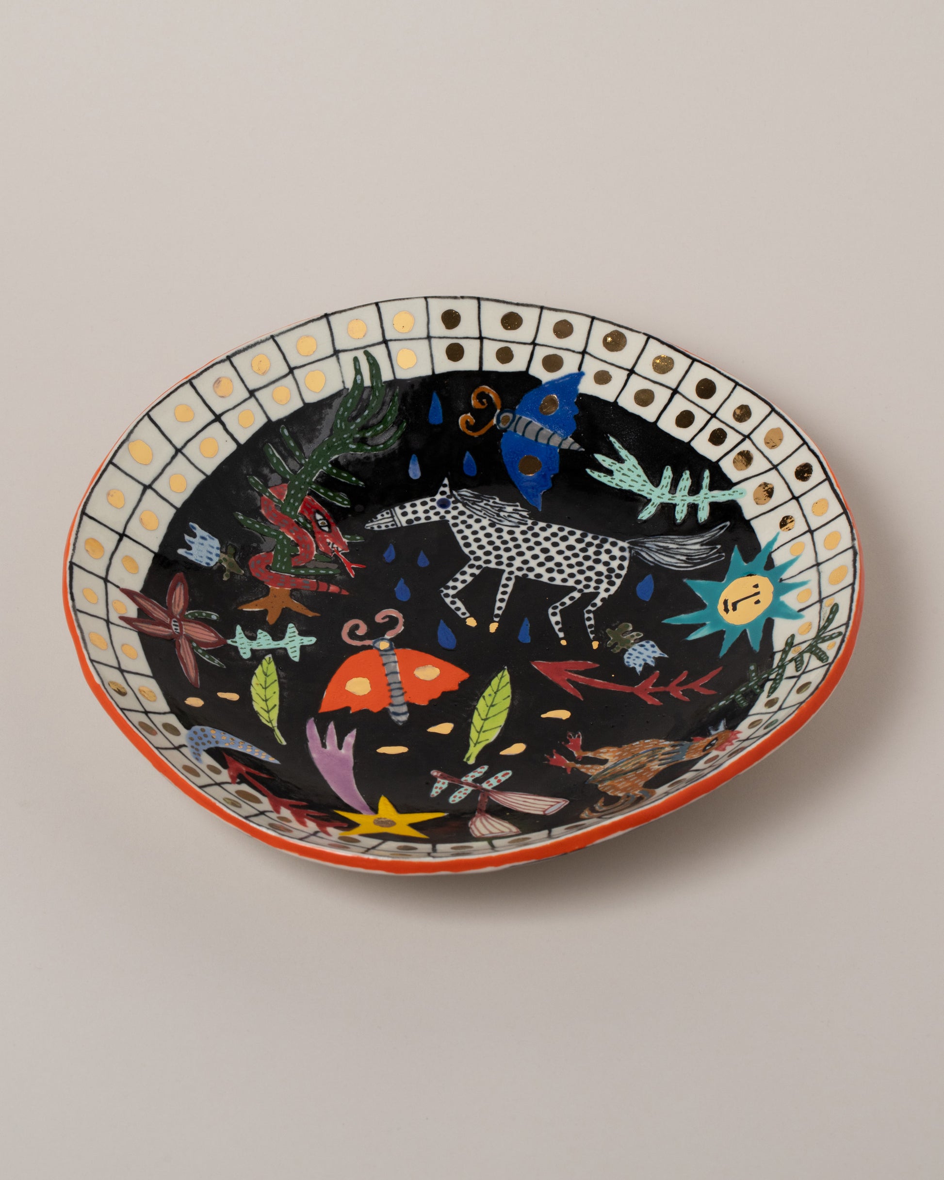 Closeup details of the Suzanne Sullivan Seven Saintly & Virtuous Pasta Bowl on light color background.