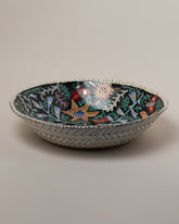 Suzanne Sullivan So Well & Merrily Serving Bowl on light color background.