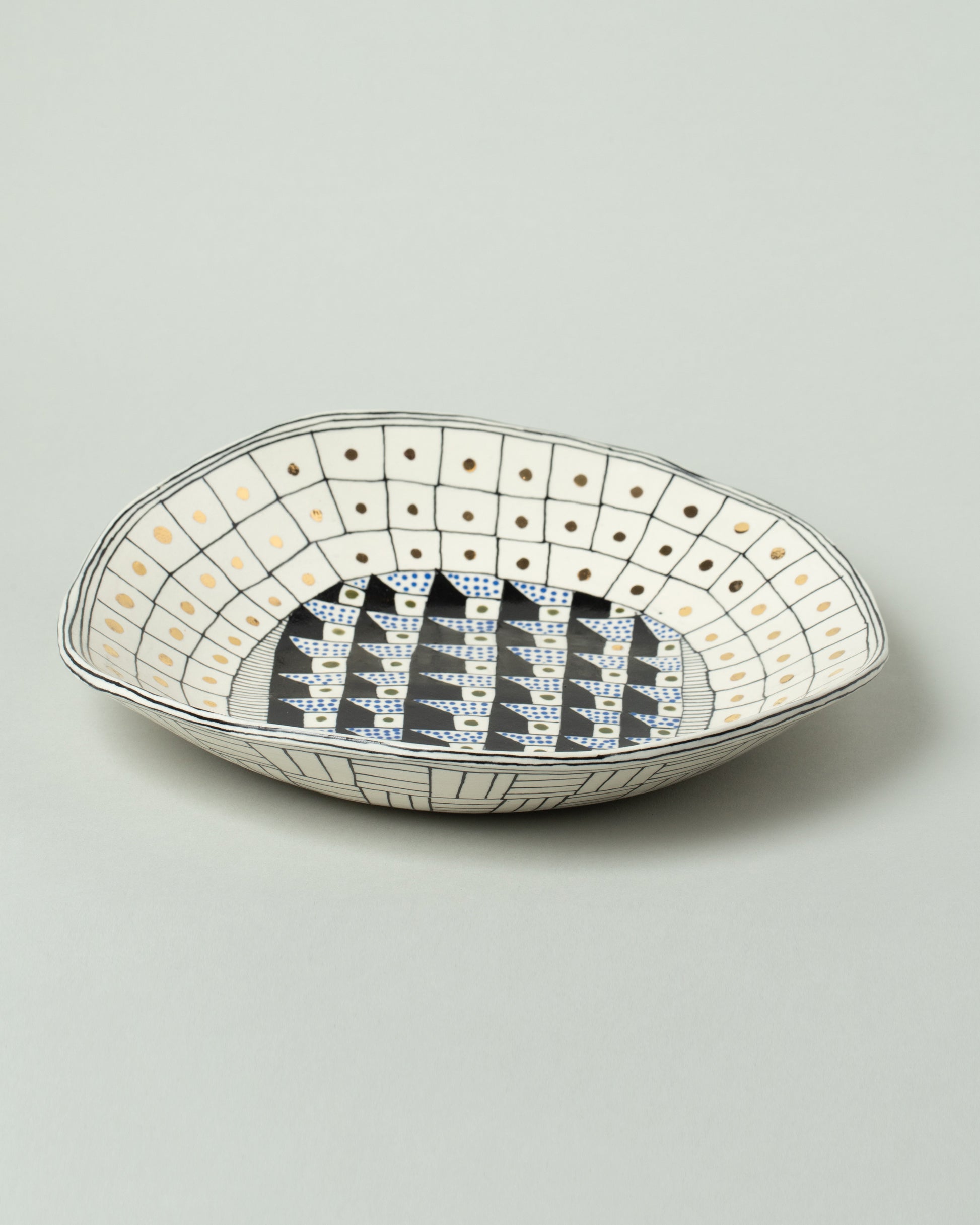 Suzanne Sullivan Four Pasta Bowl on light color background.