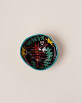 Suzanne Sullivan Scorpio Zodiac Sign Small Bowl on light color background.