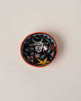 Suzanne Sullivan Taurus Zodiac Sign Small Bowl on light color background.