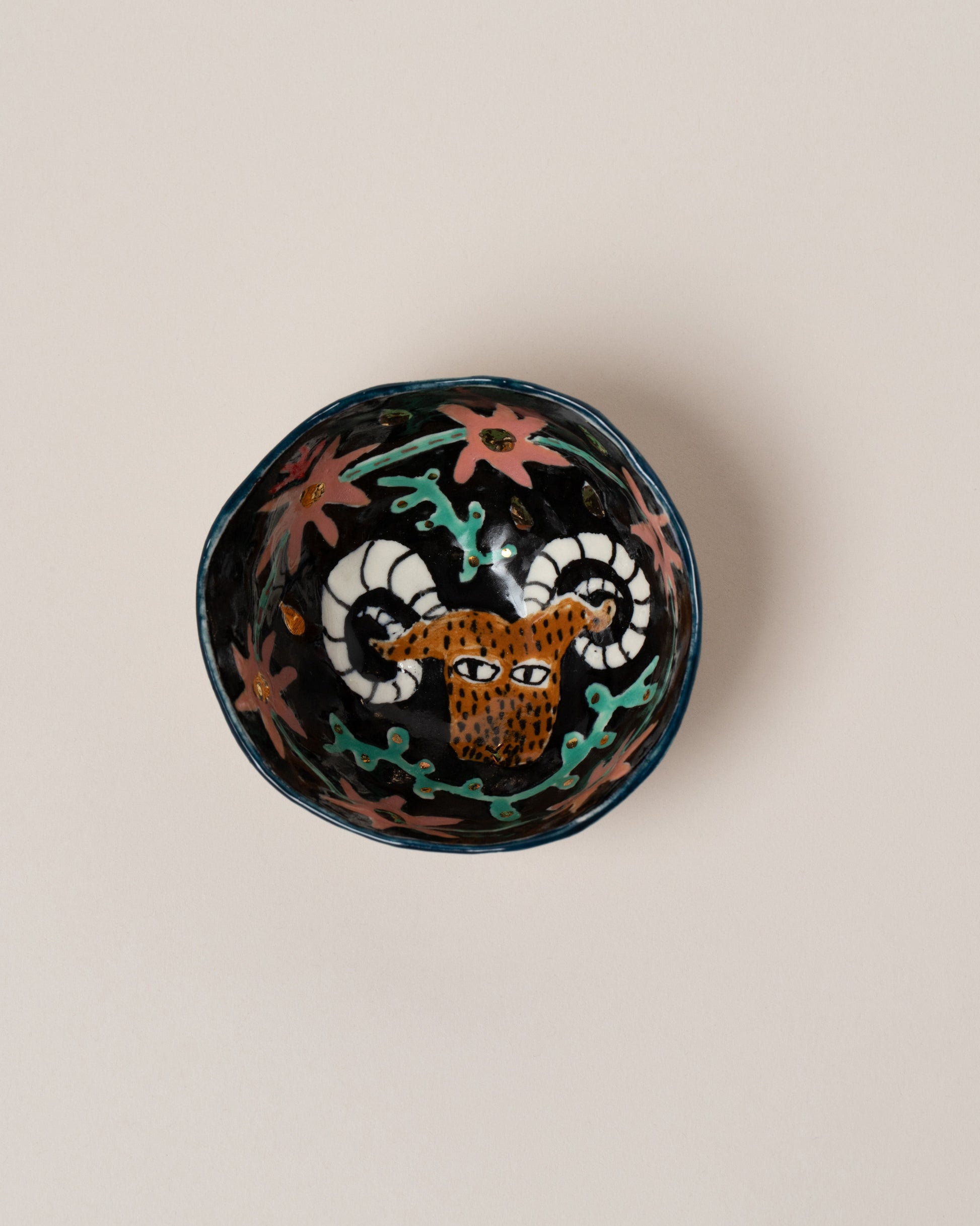 Suzanne Sullivan Aries Zodiac Sign Small Bowl on light color background.