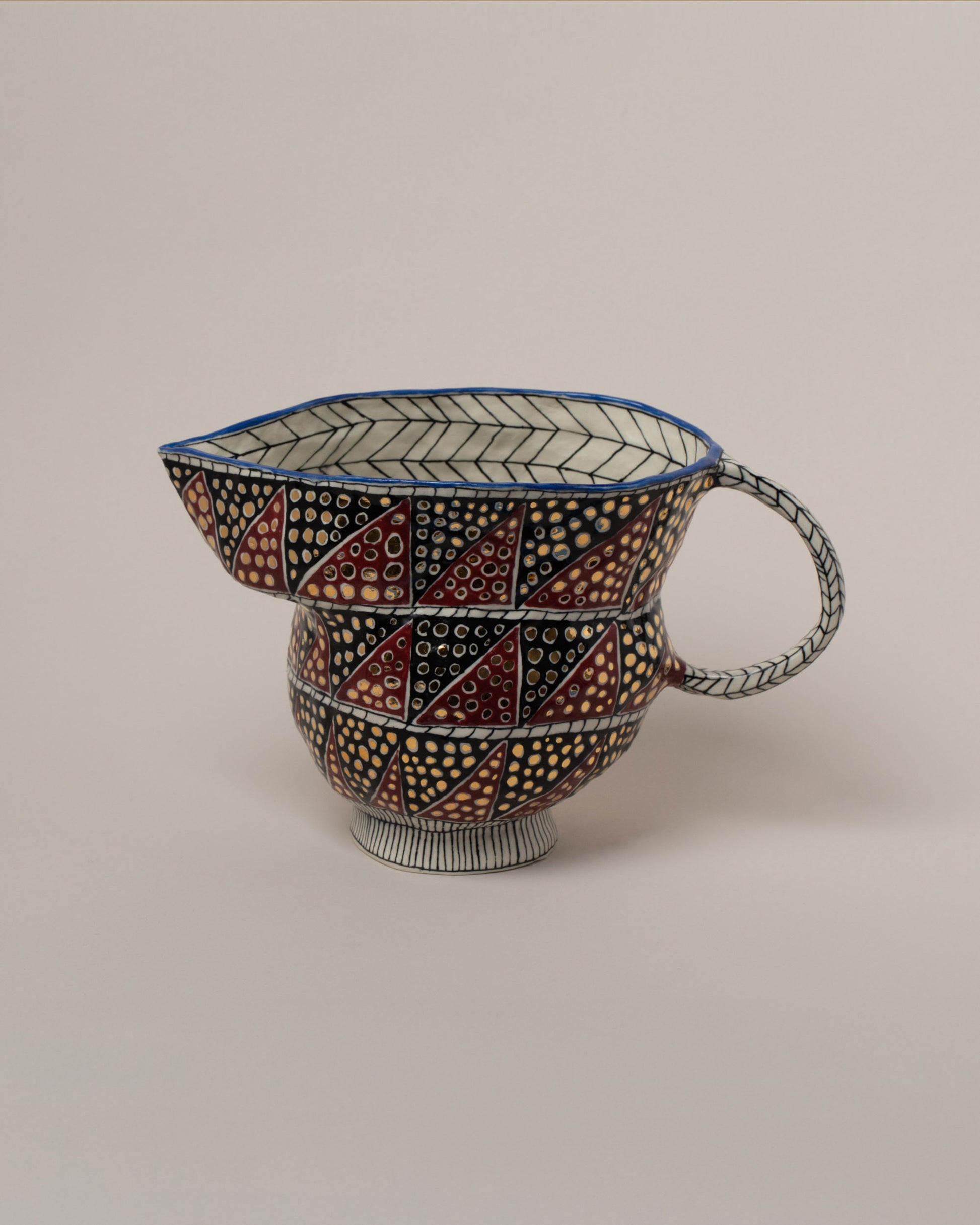 Suzanne Sullivan Albeit On The Sky Pitcher on light color background.