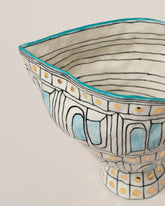 Closeup details of the Suzanne Sullivan Mirror Of All Graciousness Pitcher on light color background.