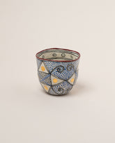 Suzanne Sullivan Three The Long Journey Tumbler on light color background.