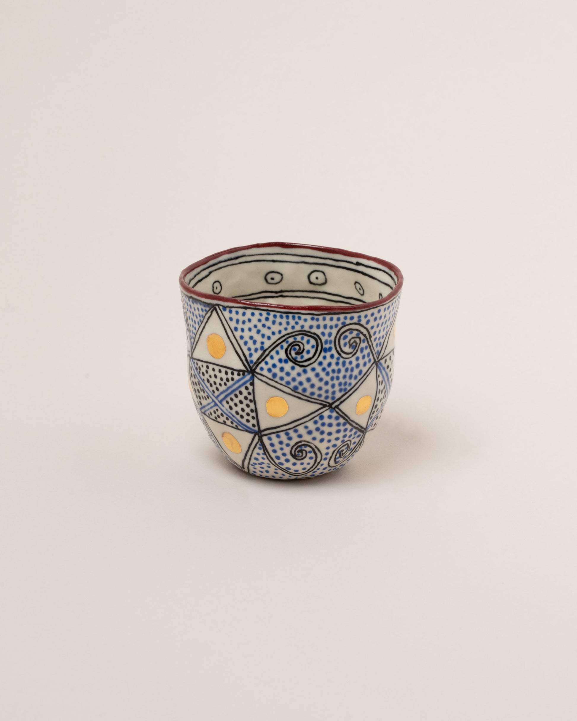 Suzanne Sullivan Three The Long Journey Tumbler on light color background.