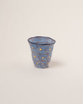 Suzanne Sullivan Ten The Long Journey Tumbler on light color background.