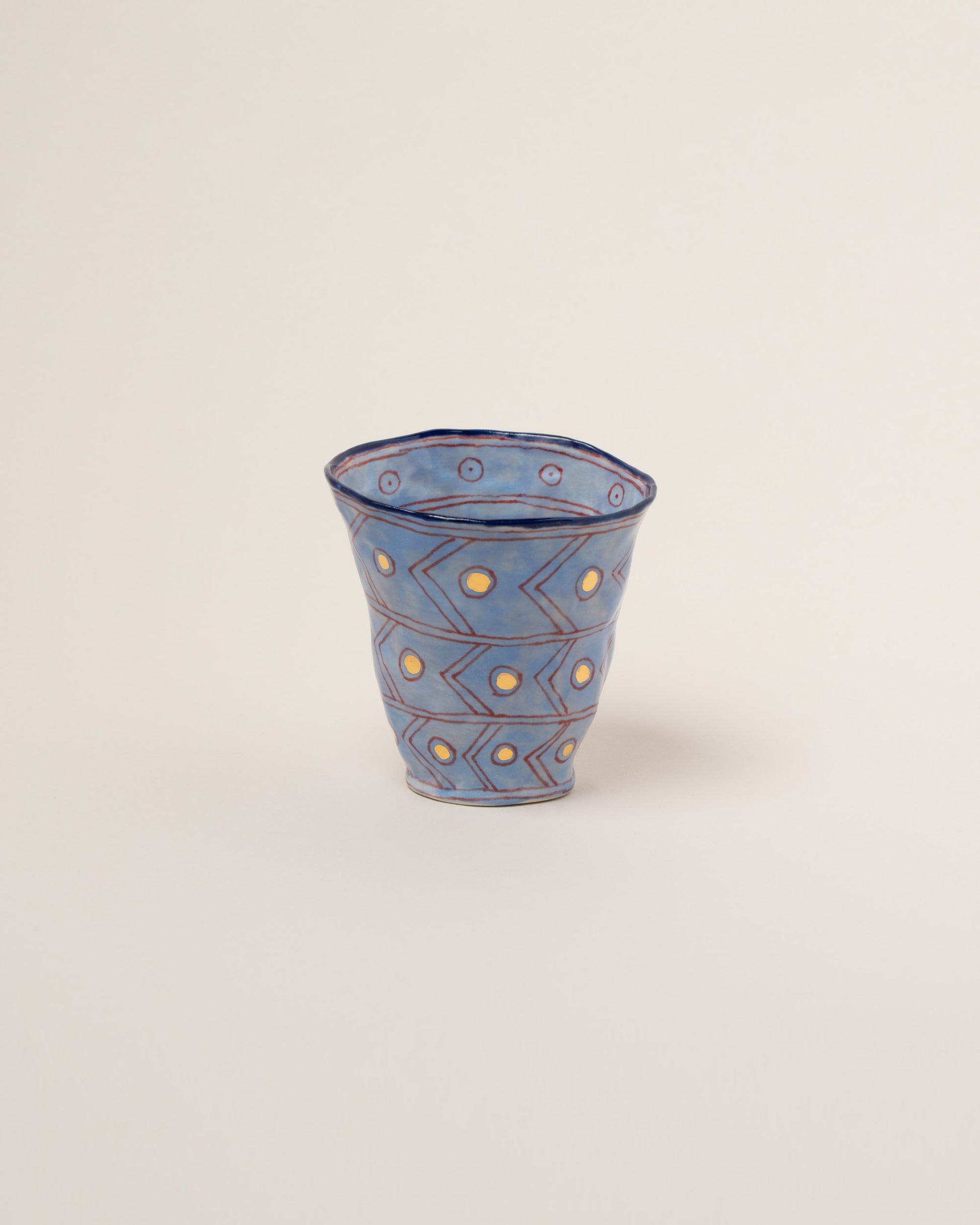 Suzanne Sullivan Ten The Long Journey Tumbler on light color background.