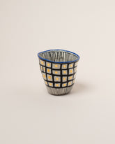 Suzanne Sullivan Twenty-One The Long Journey Tumbler on light color background.