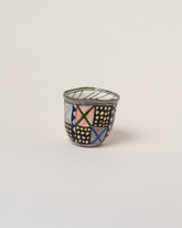 Suzanne Sullivan Twenty-Six The Long Journey Tumbler on light color background.