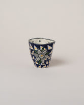 Suzanne Sullivan Thirty-Three The Long Journey Tumbler on light color background.