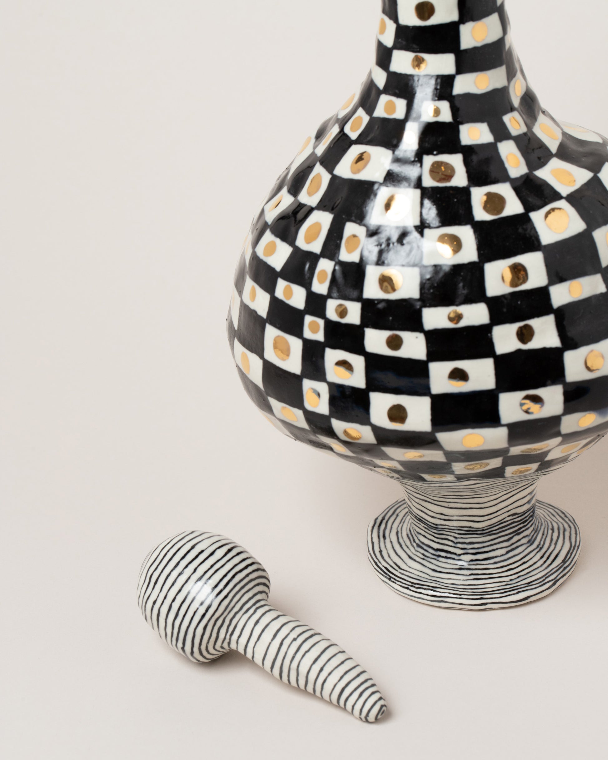 Closeup details of the Suzanne Sullivan Without More Ado Carafe With Stopper on light color background.