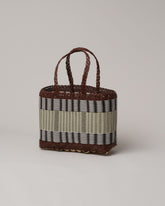 Palorosa Chocolate & Palm Small Handwoven Mercado Basket Bag on light color background.