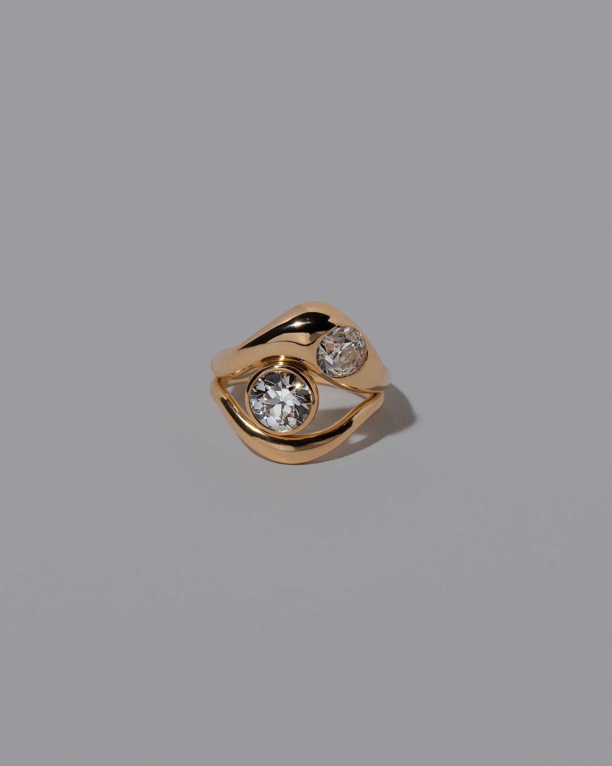 Diamond Two Ring on light color background.