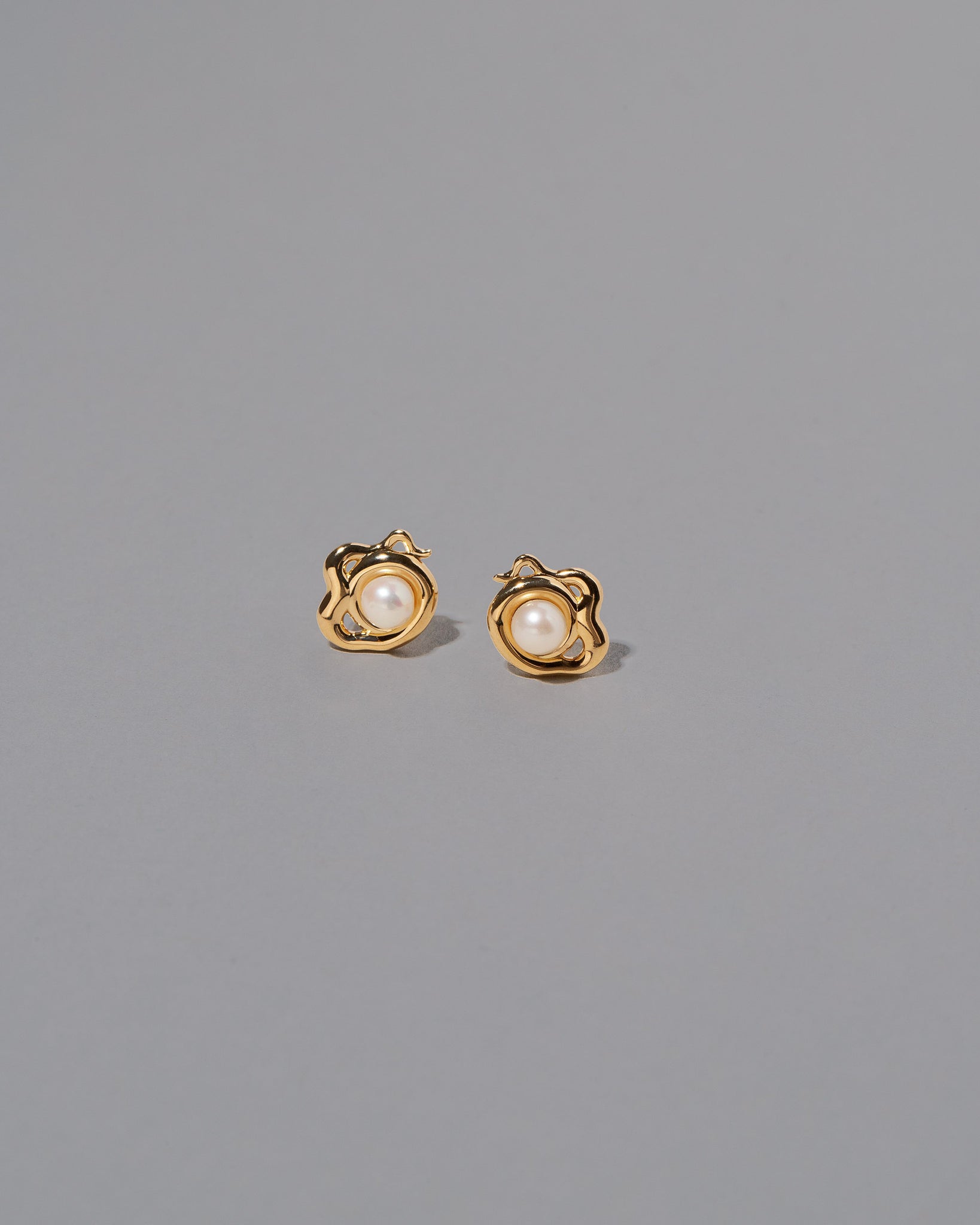 Moon Earrings on light color background.