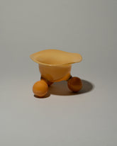 Ornamental by Lameice Topaz Yellow Opaque Dreamlike Honey Bowl on light color background.