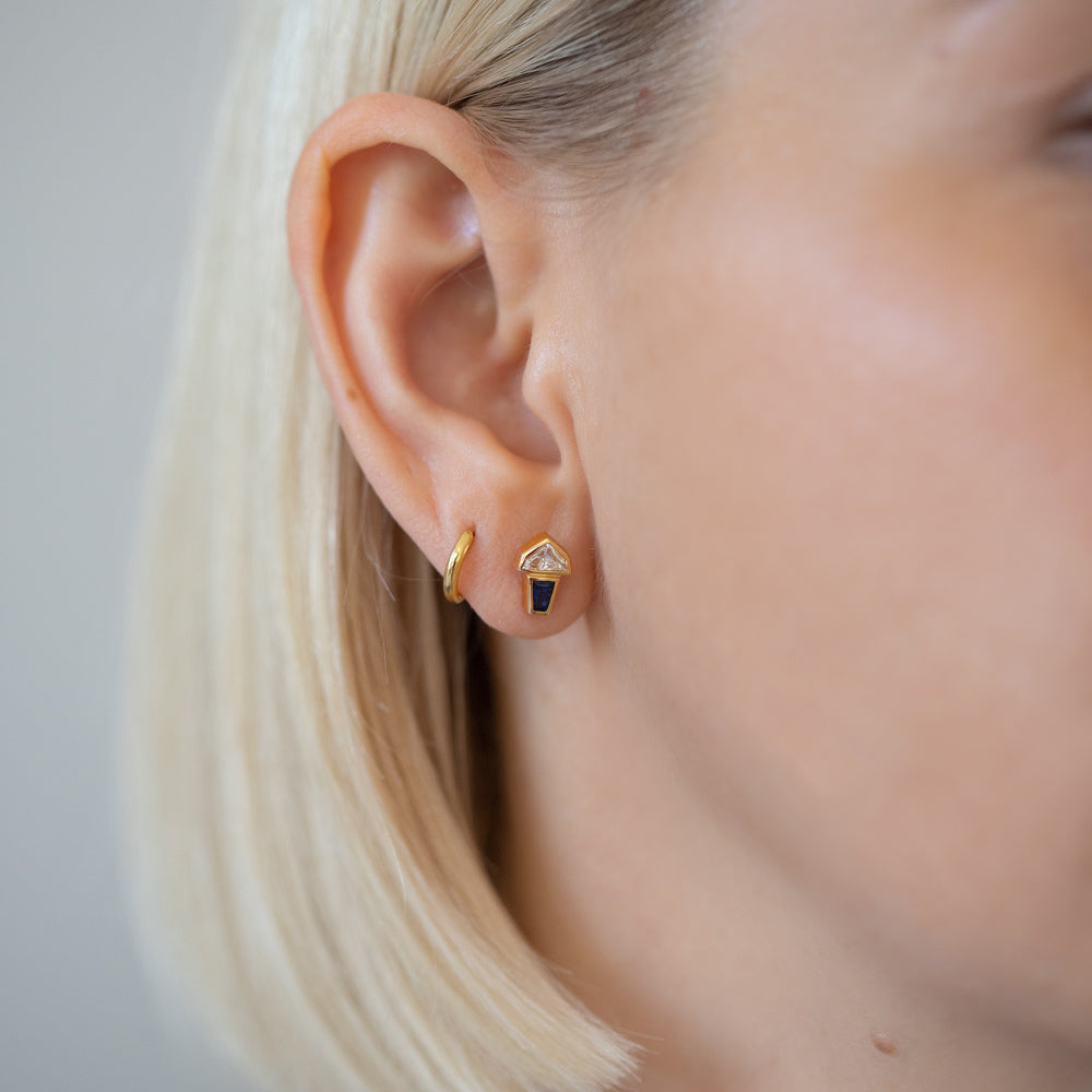 product_details::Vela Earrings on model.