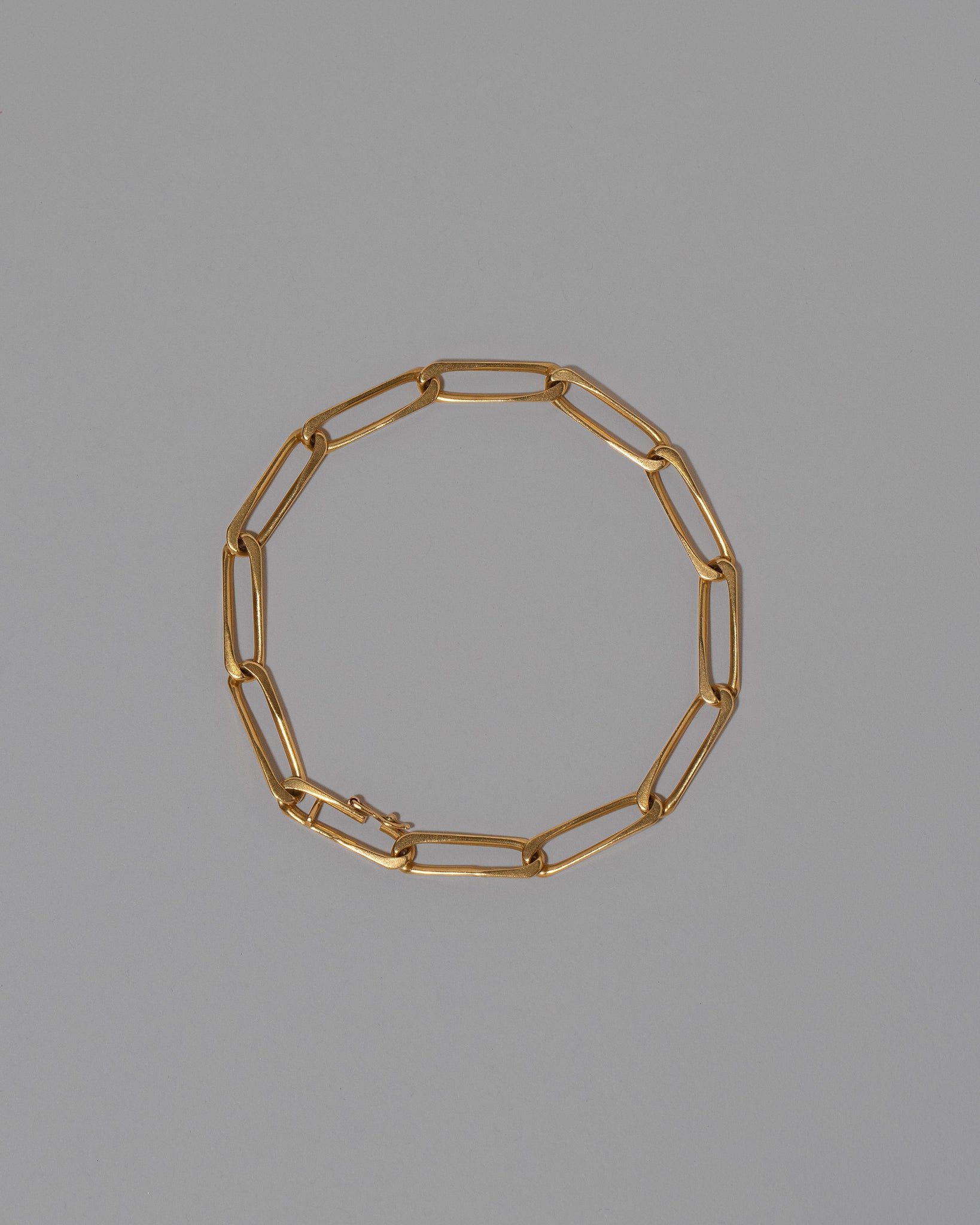Vintage Cartier Open Oval Curb Chain Bracelet on light color background.